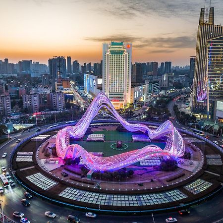 Ramada Plaza Optics Valley Hotel Ухань Экстерьер фото